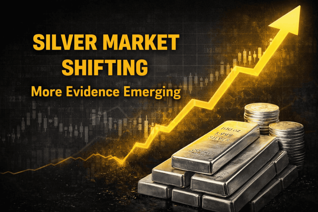 Silver bullion bars and coins with rising price chart showing changes emerging in the silver market