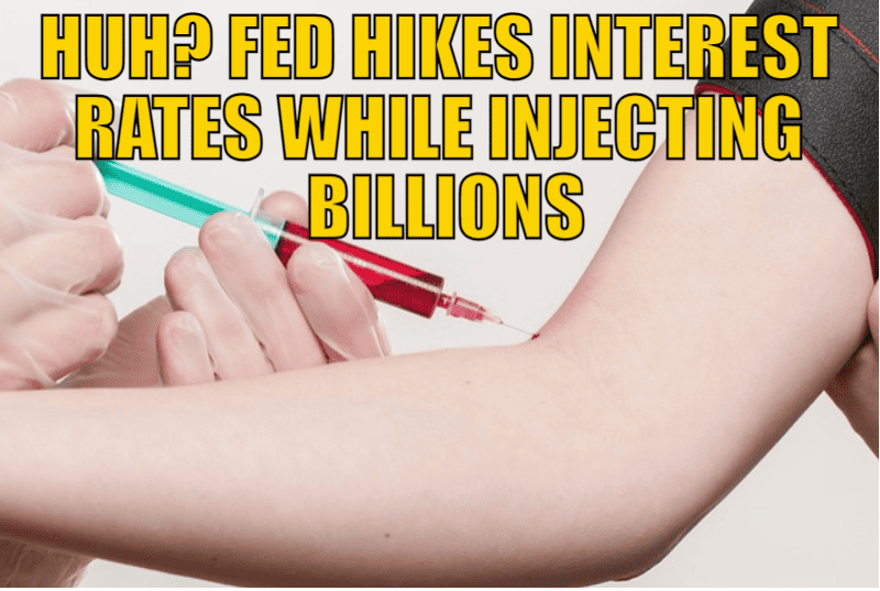 Huh? Fed Hikes Interest Rates While Injecting Billions